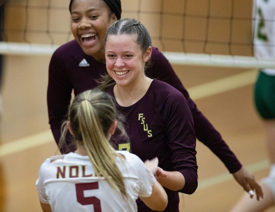 Florida High setter Kenzie Hultquist (7) celebrates a point. The Florida High Seminoles swept the Lincoln Trojans on Tuesday, Sept. 20, 2022.