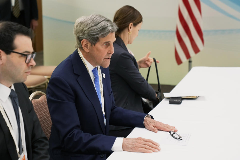 U.S. Special Presidential Envoy for Climate John Kerry, center, speaks during his bilateral meeting with Japan's Environment Minister Akihiro Nishimura in the G-7 ministers' meeting on climate, energy and environment in Sapporo, northern Japan, Saturday, April 15, 2023. (AP Photo/Hiro Komae)