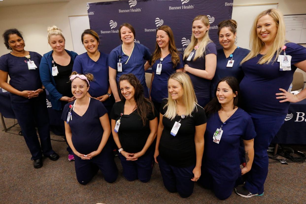 Most of the sixteen pregnant nurses who work together in the intensive care unit at Banner Desert Medical Center: AP