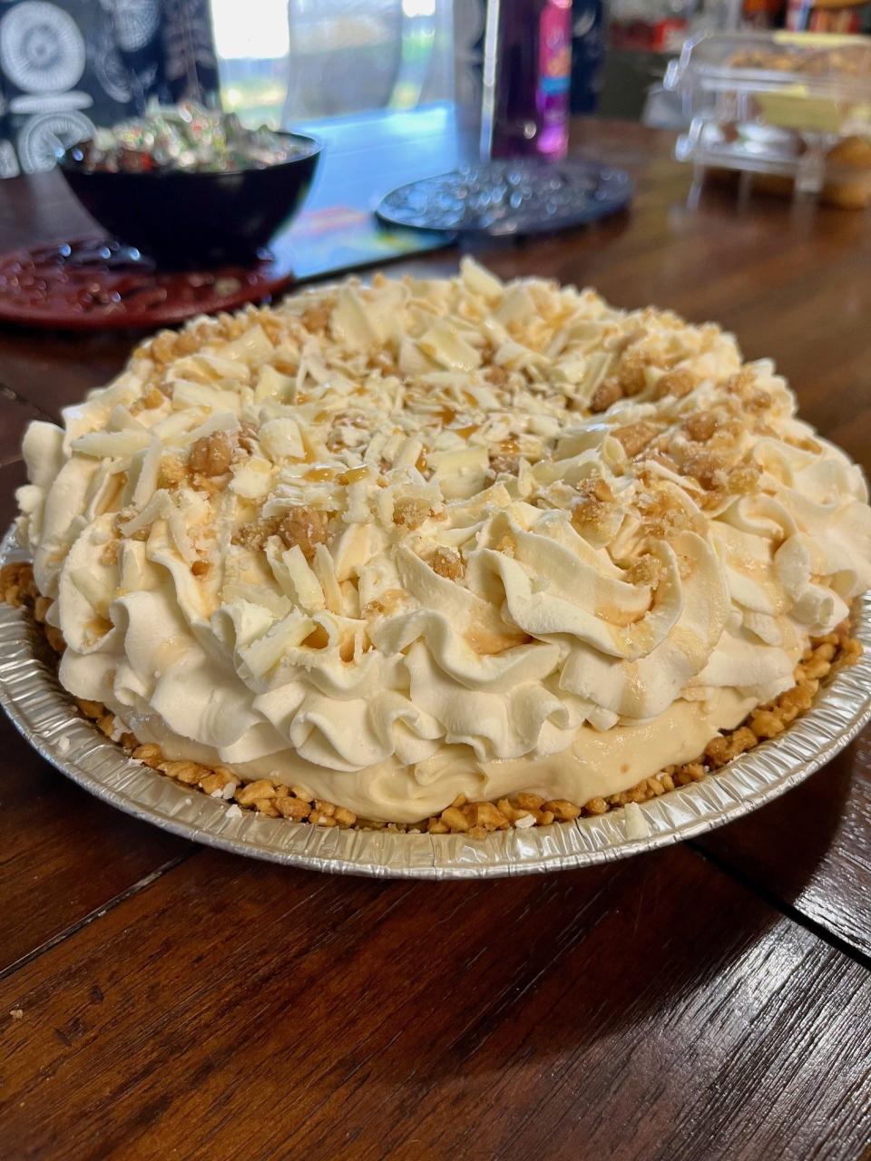 This white chocolate Snicker cheesecake from Shawn & Tony's Kitchen will melt in your mouth.