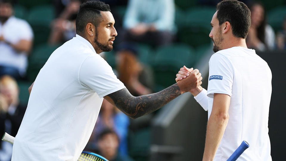 Nick Kyrgios and Gianluca Mager, pictured here shaking hands after the clash at Wimbledon.