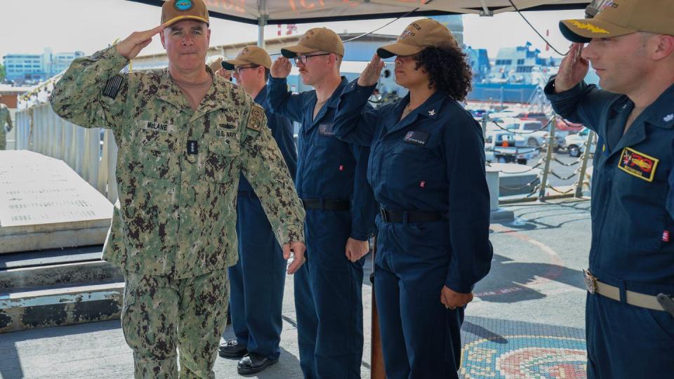 U.S. Navy Vice Adm. Brendan McLane, Commander, Naval Surface Force, is piped aboard USS Decatur (DDG 73) during his visit to the Pearl Harbor Waterfront at Joint Base Pearl Harbor-Hickam, Hawaii, Feb. 8, 2024. (Mass Communication Specialist Seaman Gavin Arnoldhendershot/US Navy)
