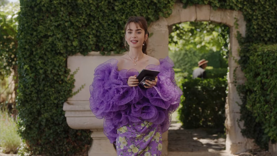 lily collins in emily in paris season 3 wearing a flounced jacket and floral corset dress