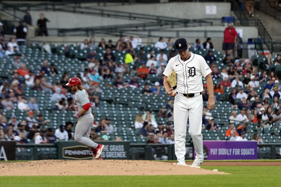 Detroit Tigers starting pitcher Matt Manning walks on the mound as St. Louis Cardinals' Brendan Donovan rounds the bases after a two-run home run during the fifth inning in the second game of a baseball doubleheader, Tuesday, April 30, 2024, in Detroit. (AP Photo/Carlos Osorio)