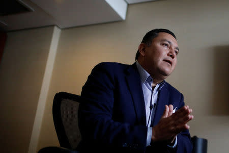 Venezuelan evangelical pastor and presidential pre-candidate Javier Bertucci speaks during an interview with Reuters in Caracas, Venezuela February 21, 2018. REUTERS/Marco Bello