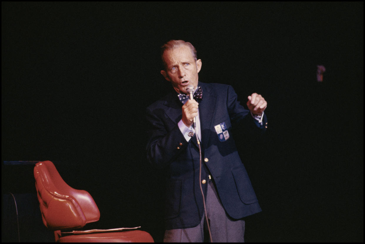 American entertainer Bing Crosby (born Harry Crosby Jr, 1903 - 1977) performs on stage at the Concord Pavilion, Concord, California, August 16, 1977. The performance, billed as 'Bing Crosby & Friends,' was his last live performance in the United States. (Photo by Janet Fries/Getty Images)