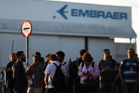 Employees of Embraer are seen during a protest against the company sale to Boeing in Sao Jose dos Campos, Brazil January 17, 2018. Picture taken January 17, 2018. REUTERS/Roosevelt Cassio