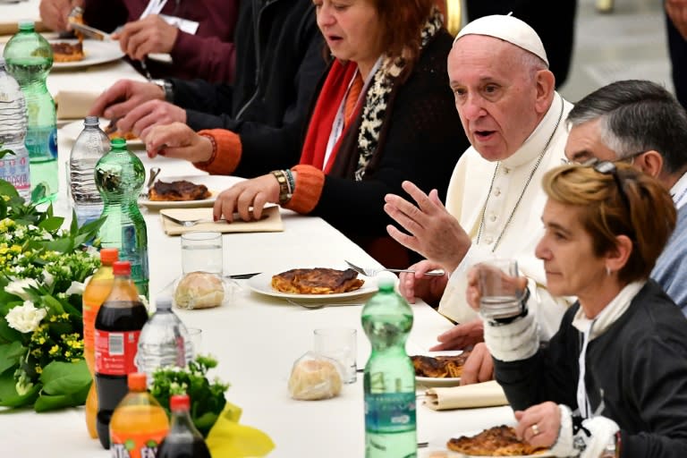 After his sermon, Pope Francis sat down to lunch with poor people as part of "World Day of the Poor"