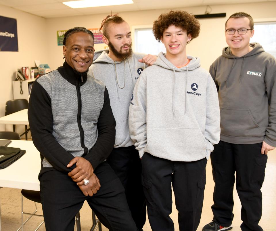 Kelly O. Williams Sr., a Timken Senior High graduate, is the community engagement coordinator for the nonprofit Project REBUILD. He is shown with program participants Jordan Morris, 17 of Canton, and Jesse Minto, 17 and Jordan Cox, 21, of Massillon.