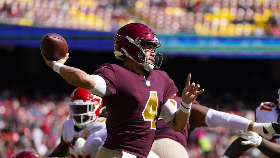 Washington Football Team quarterback Taylor Heinicke (4) throws the ball during the first half of an NFL football game against the Kansas City Chiefs, Sunday, Oct. 17, 2021, in Landover, Md. (AP Photo/Patrick Semansky)