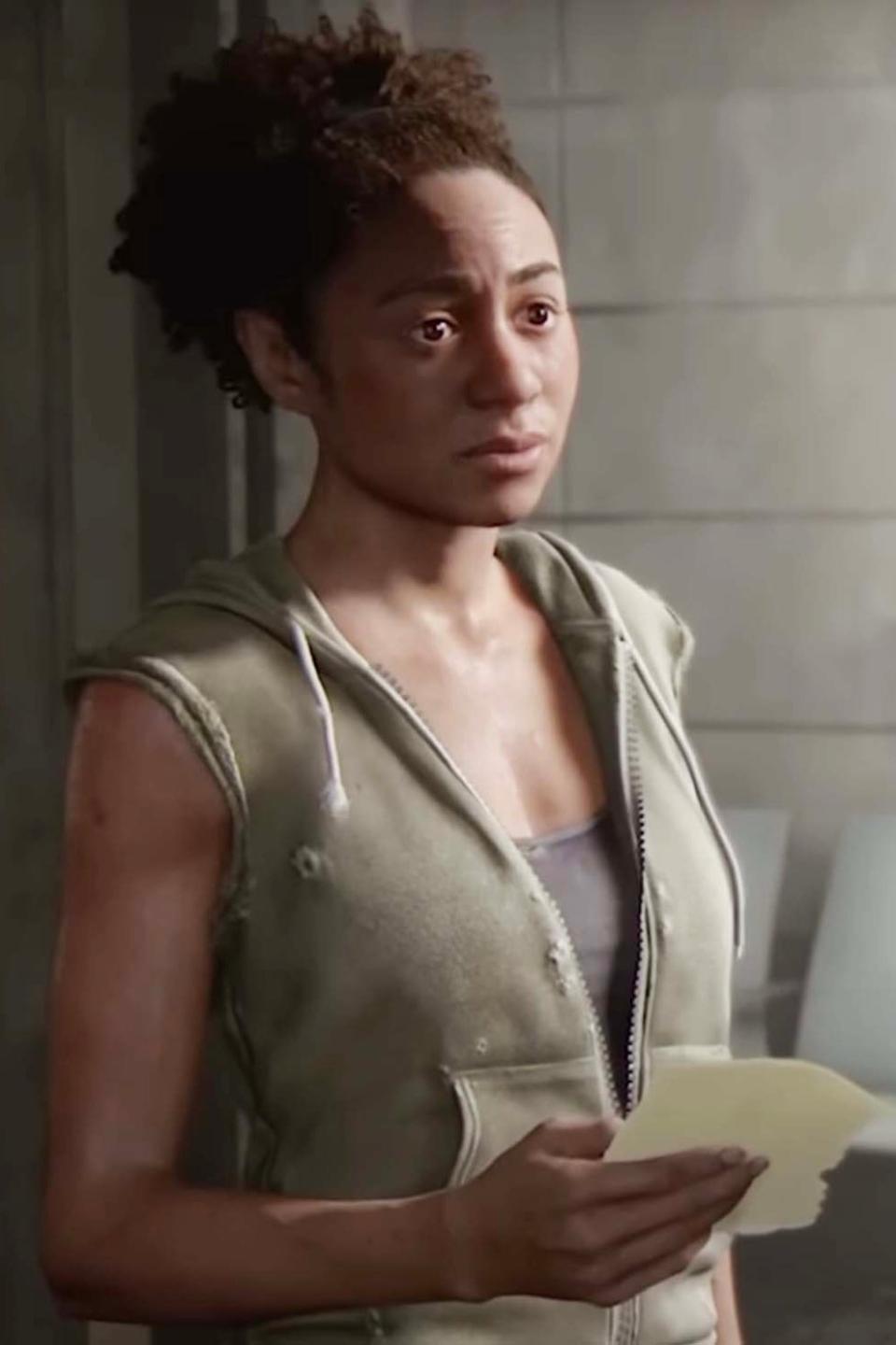 Nora in The Last of Us Part II with worried expression, holding papers