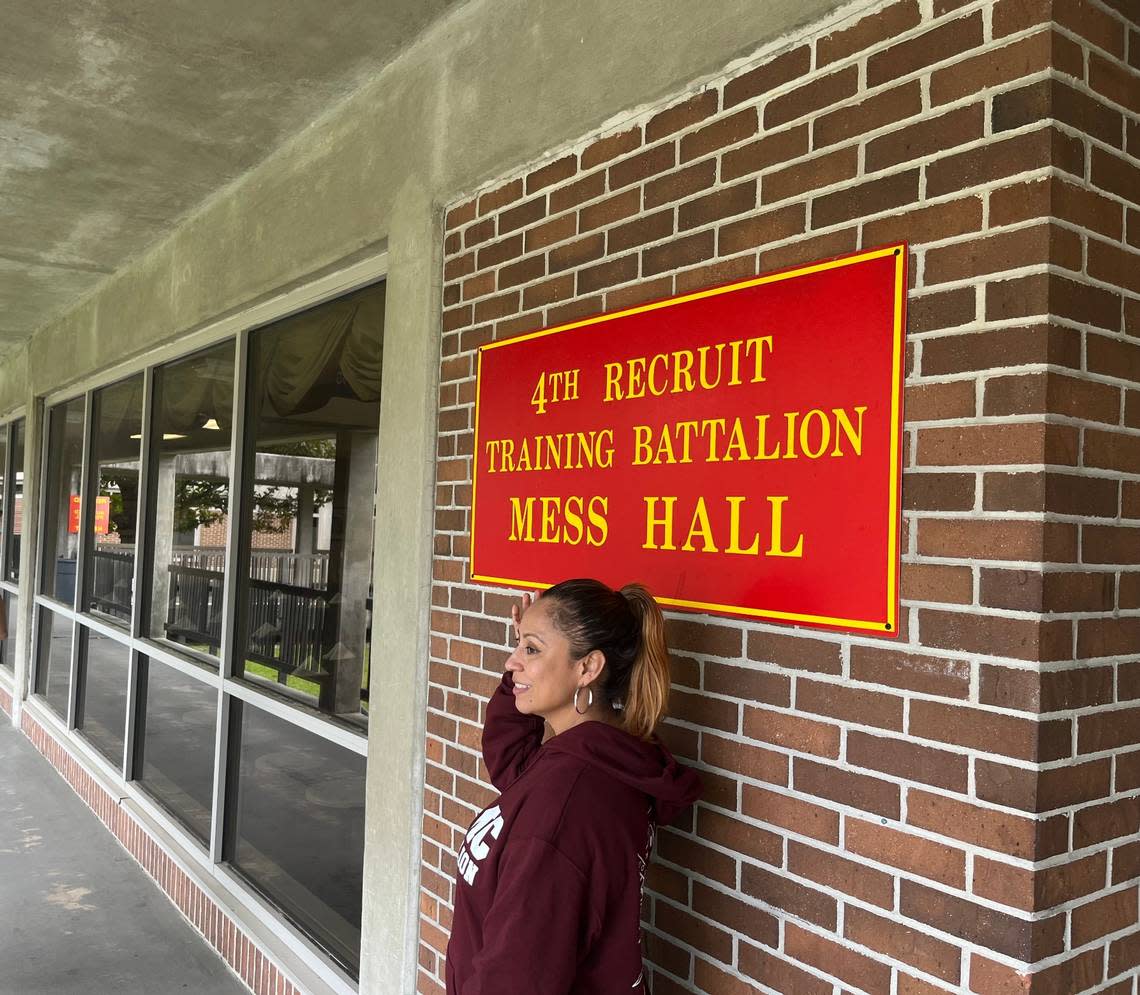 Hideshi Valle poses for a photo in front of the mess hall at the now deactivated FOur Recruit Training Battalion. Valle went through boot camp at Parris Island in 2001. “This is where I became an adult,” Valle said. The Marines said goodbye to the all-female Fourth Recreuit Training Battalion on Friday.