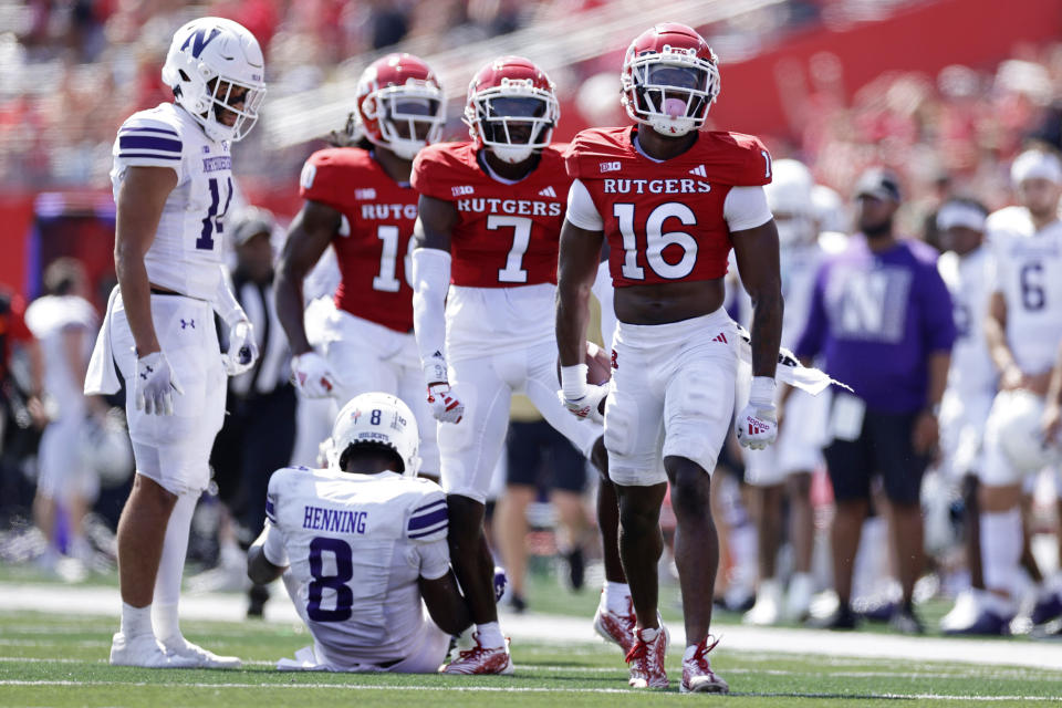 Rutgers defensive back Max Melton (16) reacts after making an interception against Northwestern during the first half of an NCAA college football game, Sunday, Sept. 3, 2023, in Piscataway, N.J. (AP Photo/Adam Hunger)