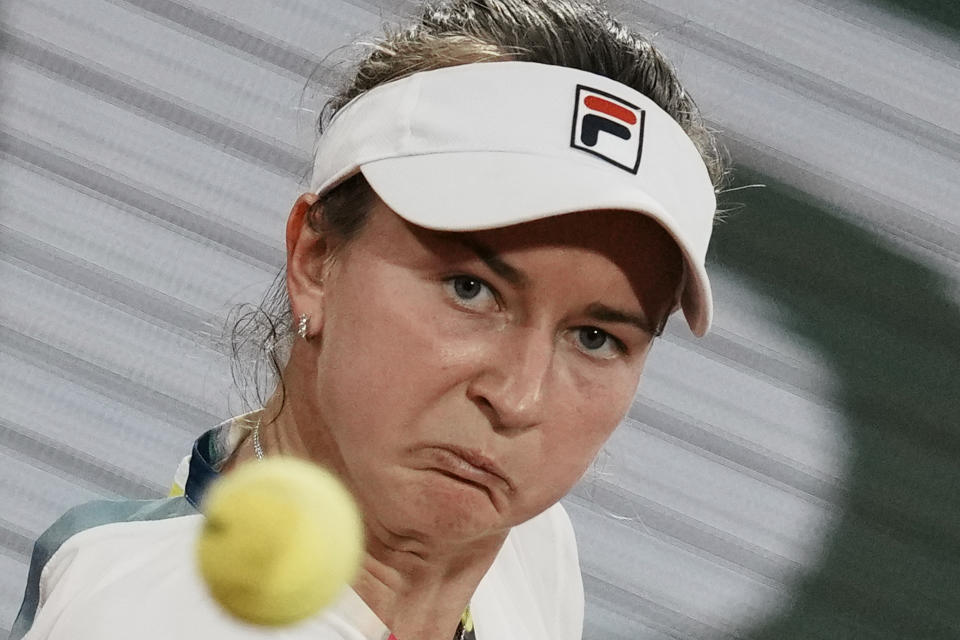 Barbora Krejcikova of the Czech Republic follows the ball as she plays a shot against France's Diane Parry during their first round match at the French Open tennis tournament in Roland Garros stadium in Paris, France, Monday, May 23, 2022. (AP Photo/Thibault Camus)