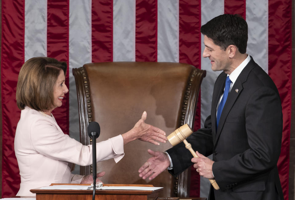 In this file photo from Tuesday, Jan. 3, 2017, House Democratic Leader Nancy Pelosi of California, left, shakes hands with Speaker of the House Paul Ryan, R-Wis., at the start of the 115th Congress, at the Capitol in Washington. The Republicans will relinquish the majority to House Democrats under leadership of Nancy Pelosi as speaker on Thursday, Jan. 3, 2019, beginning a new era of divided government. (AP Photo/J. Scott Applewhite, file)