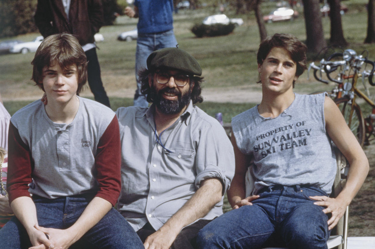 C. Thomas Howell, Francis Coppola and Rob Lowe on the set of 