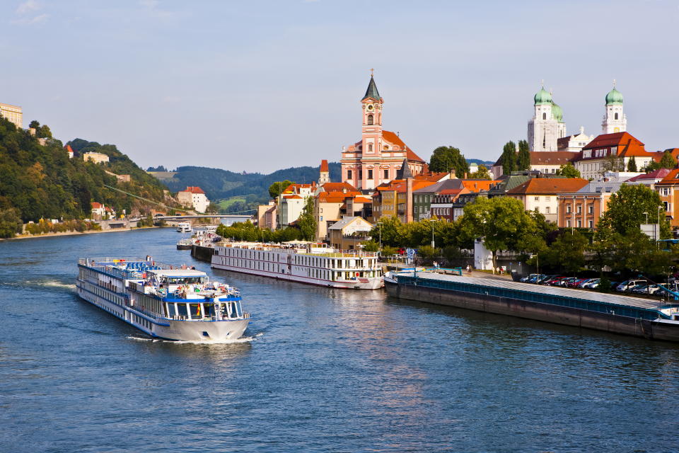 Cruise ship passing on the River Danube, Passau, Bavaria, Germany, Europe. Getty Images