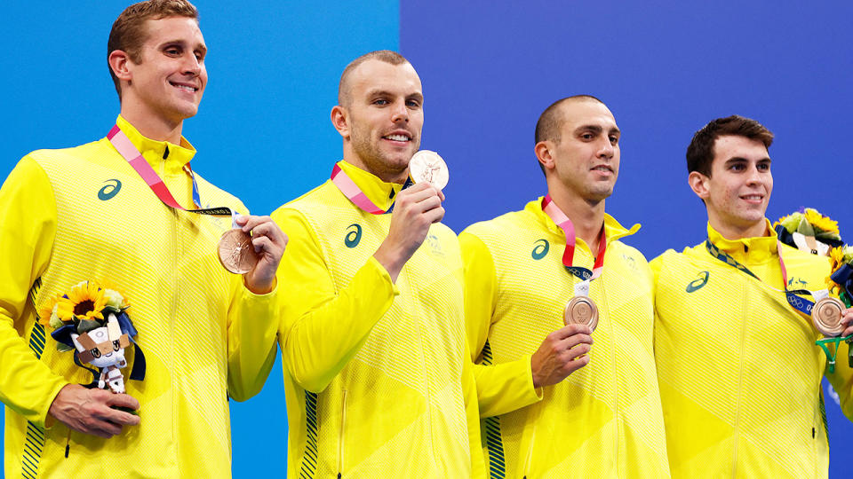 Australia's bronze medal winning 4x200m freestyle relay team came withing three hundredth of a second of being disqualified under a unique rule. (Photo by ODD ANDERSEN/AFP via Getty Images)