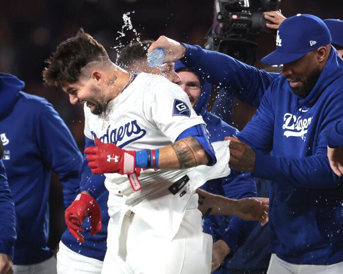 LOS ANGELES, CALIFORNIA - May 3: Dodgers Andy Pages celebrates after the game-winning.