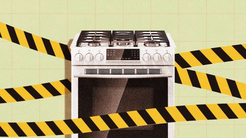 gas stove with yellow tape over it