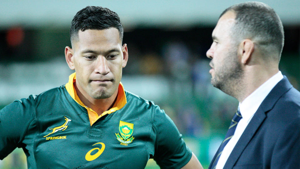 Israel Folau (pictured left) and Michael Cheika (pictured right). (Getty Images)