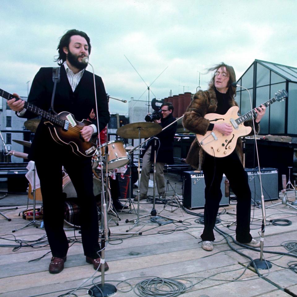 The Beatles playing atop Apple Corps Jan. 30, 1969, the last time all four performed together in concert, joined by keyboardist Billy Preston.
