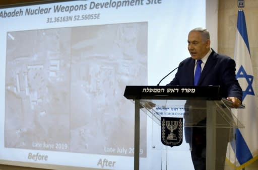 Israeli Prime Minister Benjamin Netanyahu shows to media what he says is evidence of a secret Iranian nuclear site