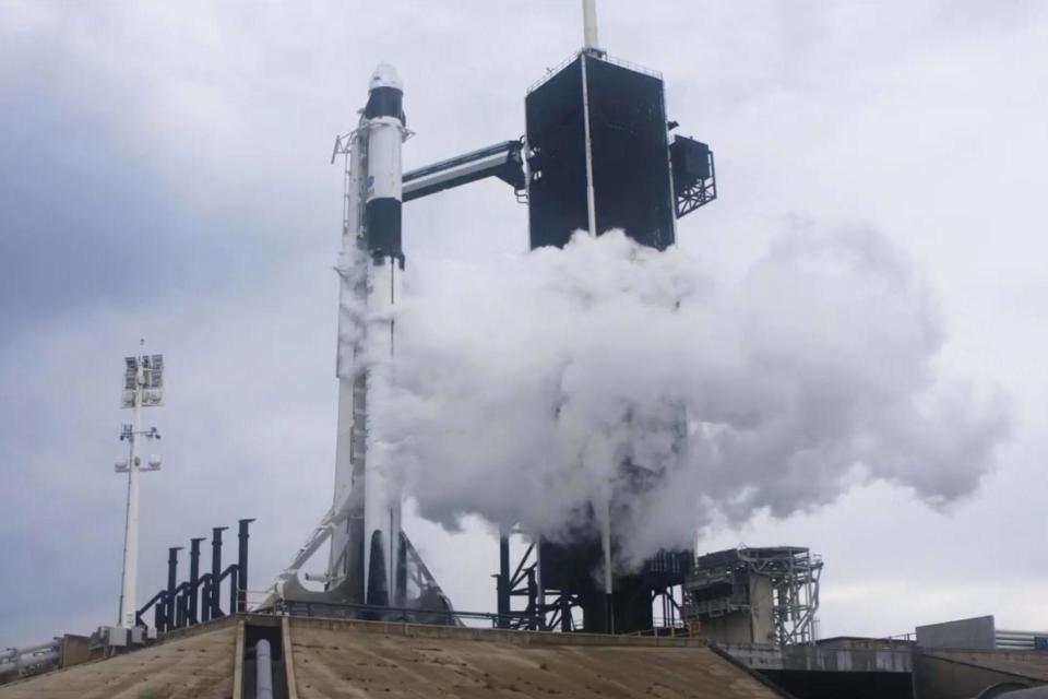 The Crew Dragon capsule prepared for the first launch from the Kennedy Space Centre, which was scrubbed due to poor weather (AP)