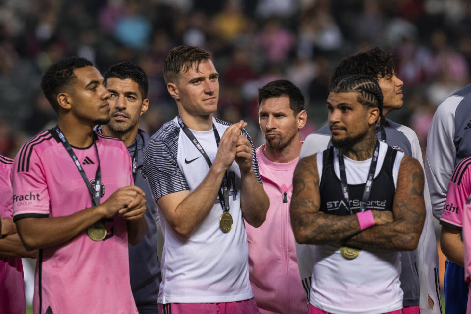 Inter Miami's Lionel Messi, center back, looks on following the friendly football match between Hong Kong Team and US Inter Miami CF at the Hong Kong Stadium in Hong Kong, Sunday, Feb. 4, 2024. (AP Photo/Louise Delmotte)