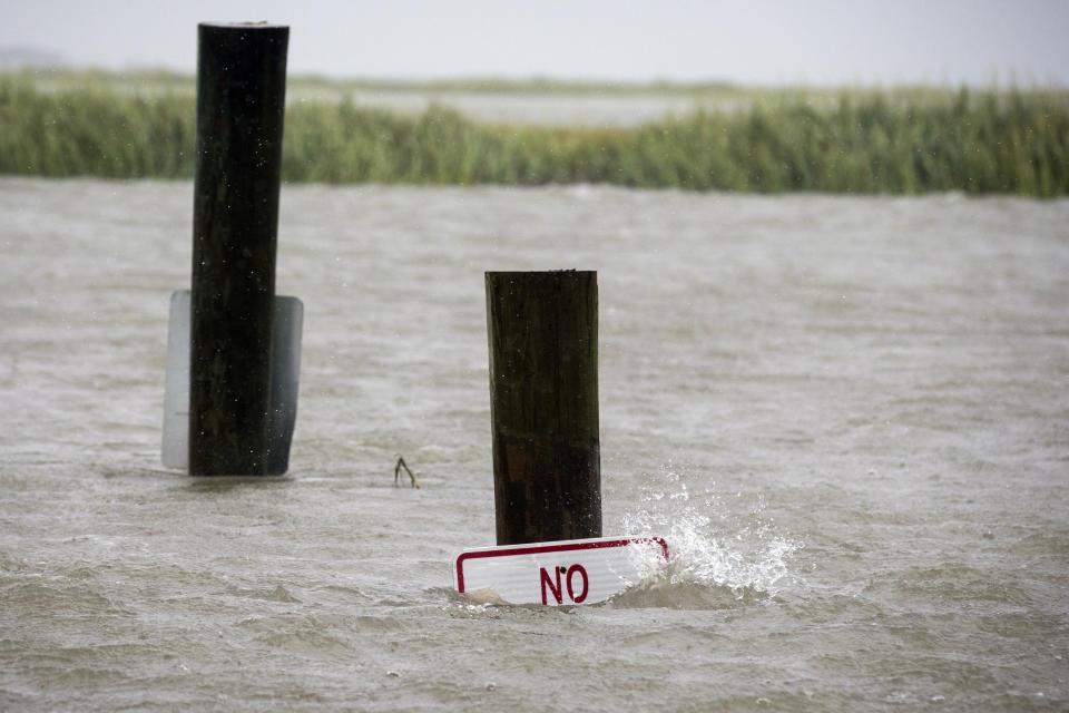 A sign at the Lazaretto Creek boat ramp as is nearly underwater at high tide as Hurricane Dorian makes its way up the east coast, Sept. 4, 2019, toward Tybee Island, Ga. (Photo: Stephen B. Morton/AP)