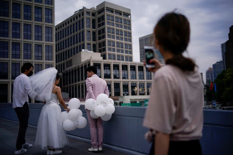 A couple prepares for their wedding photo session in Shanghai