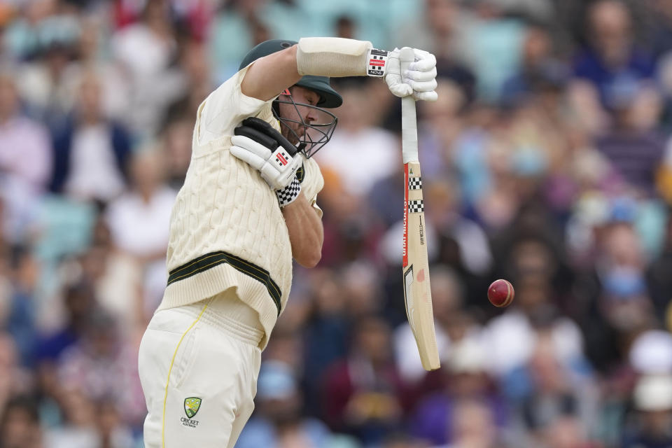 Australia's Travis Head plays a shot on day five of the fifth Ashes Test match between England and Australia, at The Oval cricket ground in London, Monday, July 31, 2023. (AP Photo/Kirsty Wigglesworth)