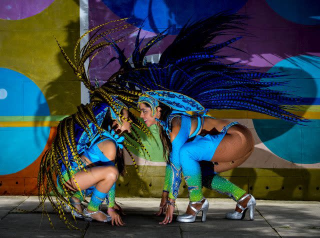Juliana Campos and her nine-year-old daughter Bella rehearse in full costume in the Notting Hill area of London prior to this year's Notting Hill Carnival