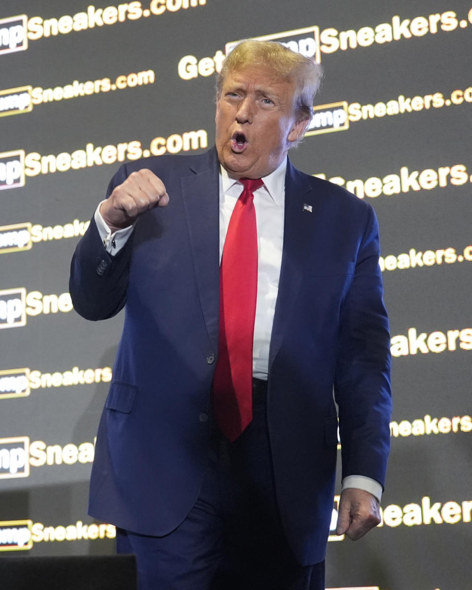 Republican presidential candidate former President Donald Trump gestures to the crowd at Sneaker Con Philadelphia, an event popular among sneaker collectors, in Philadelphia, Saturday, Feb. 17, 2024. (AP Photo/Manuel Balce Ceneta)