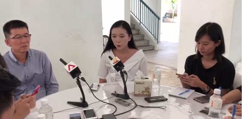 CFC Liu Kai’s father and elder sister address reporters at his funeral wake in Woodlands Crescent on Monday 5 November, 2018. The full-time national serviceman passed away following a vehicular incident on 3 November. (PHOTO: Wong Casandra/Yahoo News Singapore)