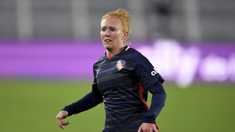 FILE - Washington Spirit defender Tori Huster (23) plays against Racing Louisville FC during an NWSL Challenge Cup soccer match, Thursday, April 15, 2021, in Washington. Five players who helped launch the National Women's Soccer League in 2013 and are still with their same teams. The list also includes Tori Huster of the Washington Spirit and the OL Reign's Megan Rapinoe, Jess Fishlock and Lauren Barnes. (AP Photo/Will Newton)