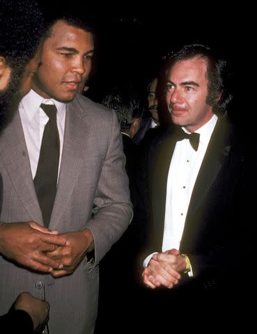 <p>Ron Galella/Ron Galella Collection via Getty</p> Muhammad Ali and Neil Diamond