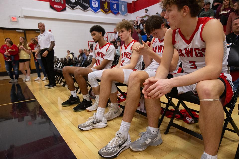 Rossville starters await their turn to be called to the court in for the War on 24 game against Silver Lake Friday, February 9, 2024, inside Rossville High School.