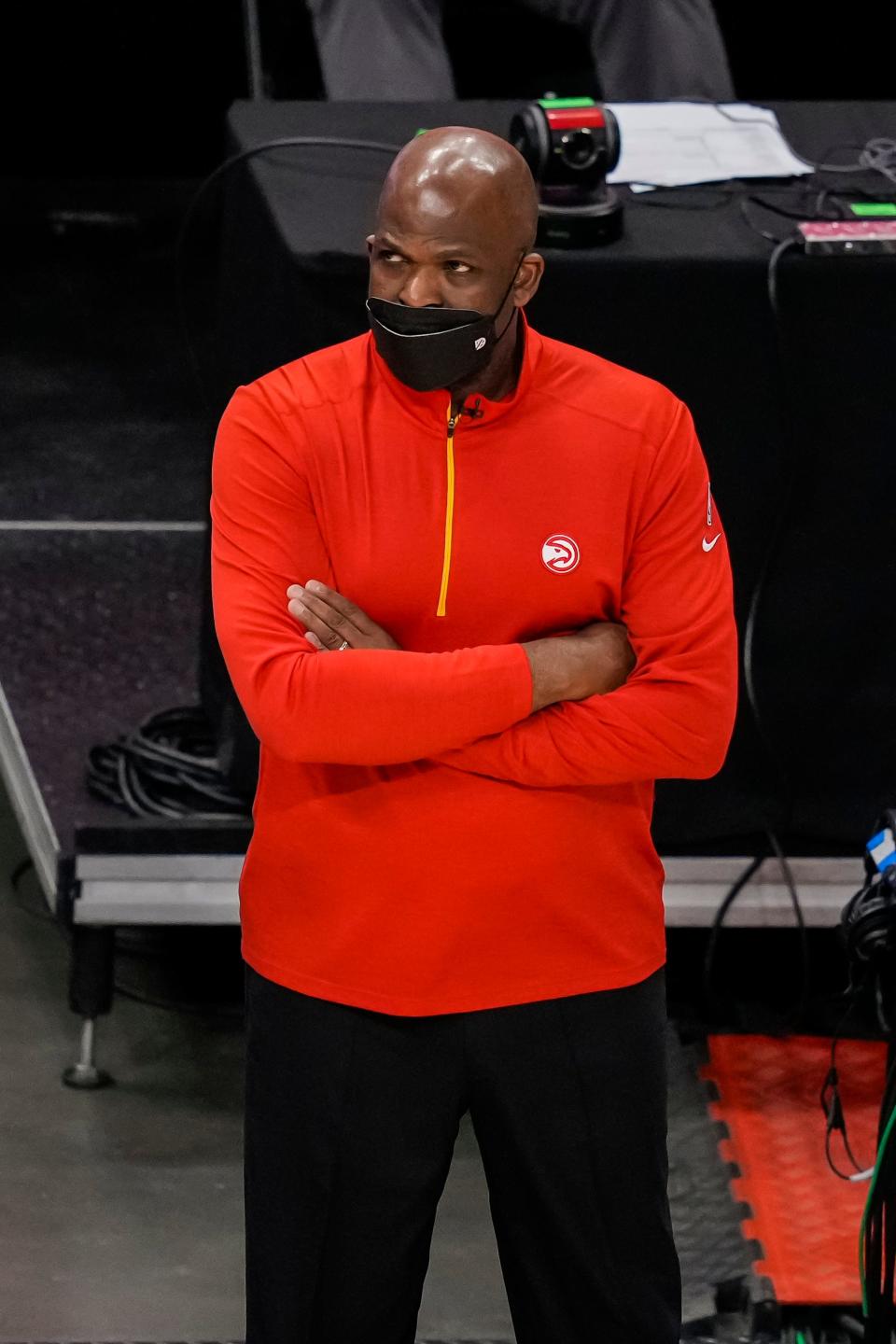 Atlanta Hawks interim head coach Nate McMillan watches the action from the bench against the Washington Wizards during the second half at State Farm Arena.
