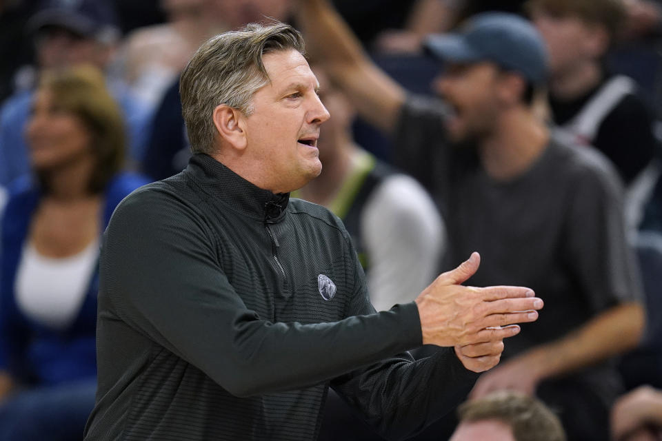 Minnesota Timberwolves coach Chris Finch asks for a timeout during the first half of the team's NBA basketball play-in tournament game against the Oklahoma City Thunder, Friday, April 14, 2023, in Minneapolis. (AP Photo/Abbie Parr)