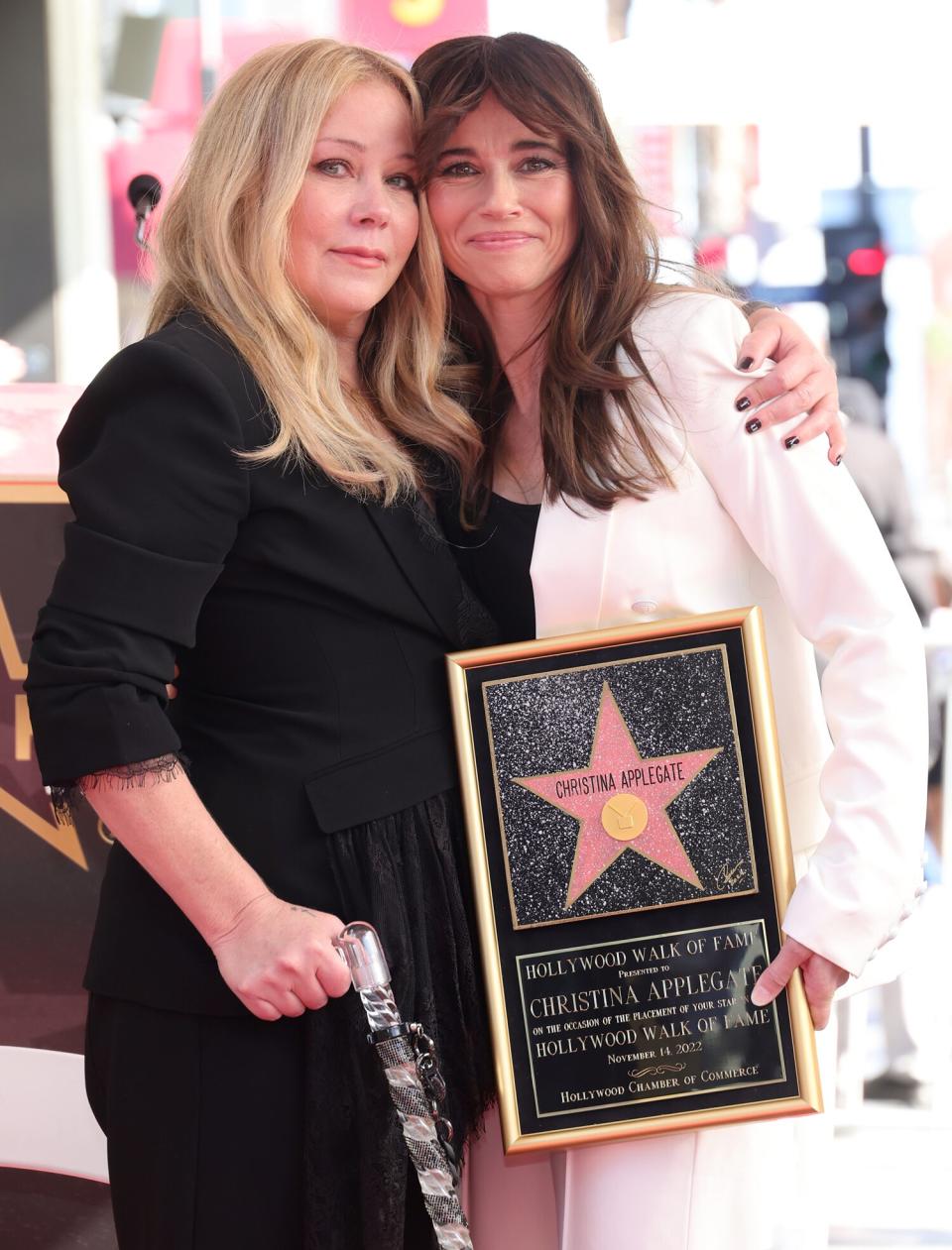 Christina Applegate and Linda Cardellini attend a ceremony honoring Christina Applegate with a star on the Hollywood Walk Of Fame