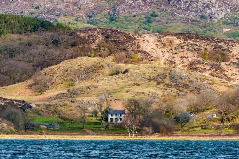 Mountains and lake on the site of Llyndy Isaf, an estate of 600 acres in Snowdonia, in the Nant Gwynant valley near Beddgelert, Gwynedd, Wales.