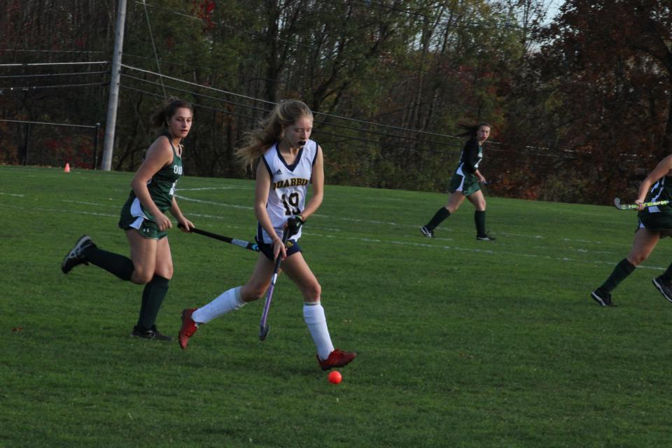 Quabbin's Annabelle Magill dribbles down the field in the CMADA Class B quarterfinal against Oakmont on Oct. 24, 2023. Quabbin won 4-0.