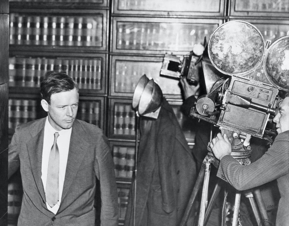 Cameras follow Charles Lindbergh as he enters Hunterdon County Court in Flemington, N.J., for the trial of Bruno Richard Hauptmann, charged in the kidnapping and murder of Lindbergh’s son, Charles Jr. <a href="https://www.gettyimages.com/detail/news-photo/cameras-follow-charles-lindbergh-as-he-enters-hunterdon-news-photo/515589018?adppopup=true" rel="nofollow noopener" target="_blank" data-ylk="slk:Getty Images;elm:context_link;itc:0;sec:content-canvas" class="link ">Getty Images</a>