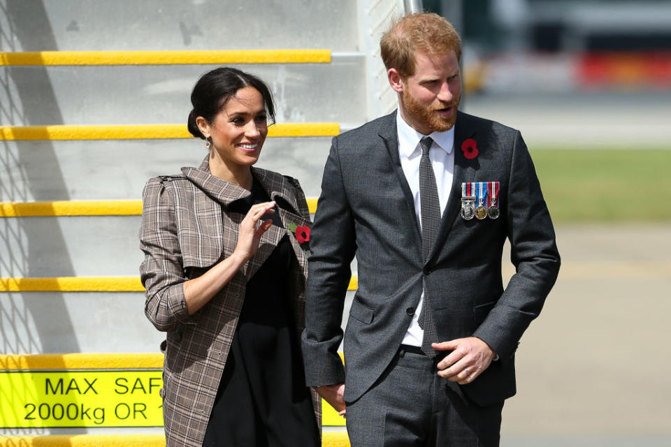 Prince Harry, Duke of Sussex and Meghan, Duchess of Sussex arrive at the Wellington International Airport, New Zealand.