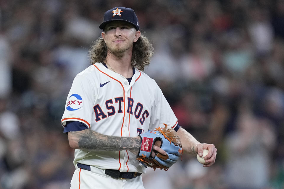Houston Astros relief pitcher Josh Hader walks near the mound as Seattle Mariners' Cal Raleigh runs the bases after hitting a go-ahead solo home run during the ninth inning of a baseball game, Sunday, May 5, 2024, in Houston. (AP Photo/Kevin M. Cox)