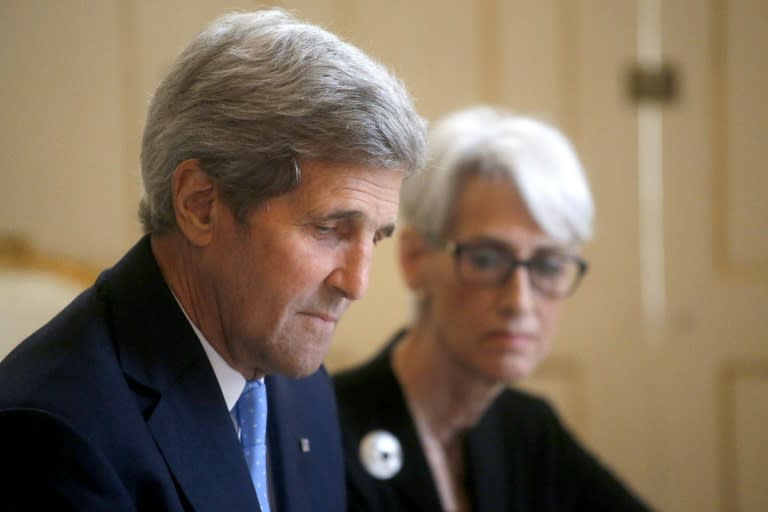 US Secretary of State John Kerry (L) and US Under Secretary for Political Affairs Wendy Sherman attend a discussion on Iran's nuclear policy in Vienna on June 30, 2015