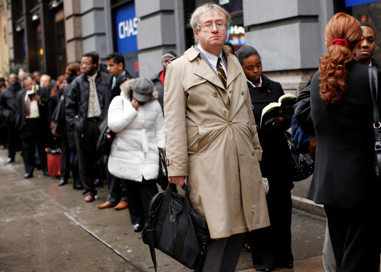 Eric Lipps, 52, waits in line to enter the NYCHires Job Fair in New York, United States, December 9, 2009. REUTERS/Shannon Stapleton/File photo