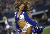 <p>A Dallas Cowboys cheerleader performs during a game against the Kansas City Chiefs during the first half at AT&T Stadium on November 5, 2017 in Arlington, Texas. The Cowboys won 28-17. (Photo by Ron Jenkins/Getty Images) </p>