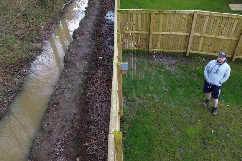 Paddy Harper in his boggy garden -Credit:EdinburghLive